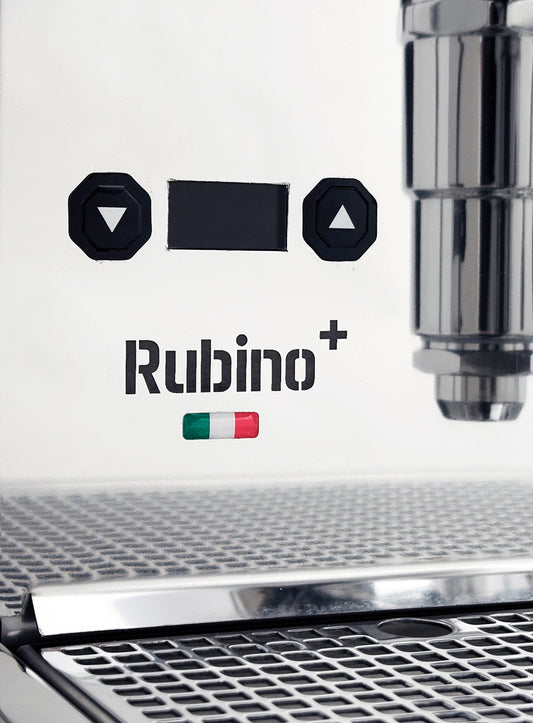 Close-up view of the Quick Mill Rubino Plus Instant Stability Espresso Machine control panel and logo.