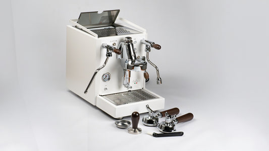 Quick Mill Rubino Luxe Espresso Machine White with accessories on a white background.
